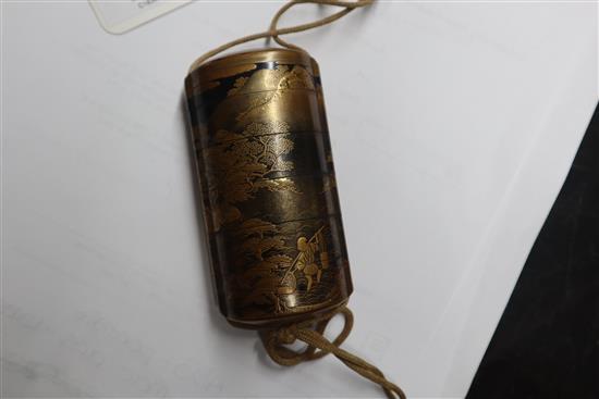 A 19th century Japanese gold lacquer five case inro, signed, together with an 18th/19th century ivory netsuke and a ojime
